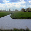 The low land of Middelpolder with the De Zwaan windmill in the distance