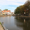 Biking along the canal in the town of Spaarndam